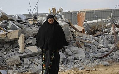 A Bedouin woman cries following the destruction of houses on January 18, 2017 in the village of Umm al-Hiran. (AFP/Menahem Kahana)