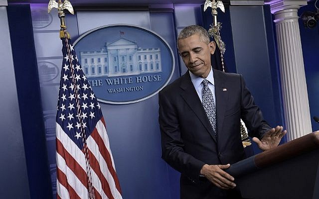 US President Barack Obama leaves after his final press conference at the White House, Washington, DC, January 18, 2017. (AFP/Brendan Smialowski)