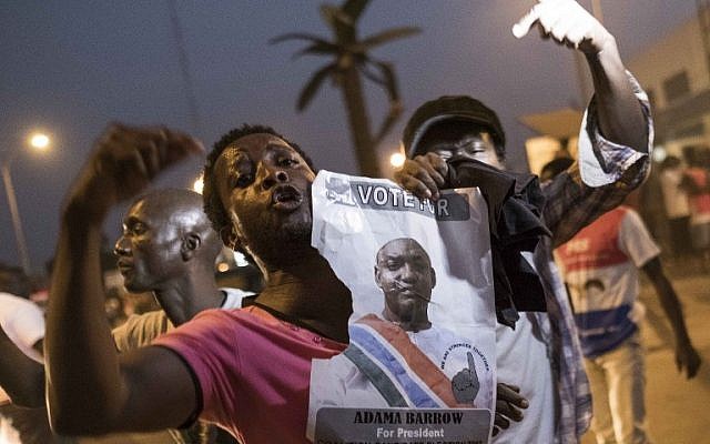People celebrate the inauguration of new Gambia's President Adama Barrow at Westfield neighborhood on January 19, 2017 in Banjul. (AFP PHOTO / STRINGER)