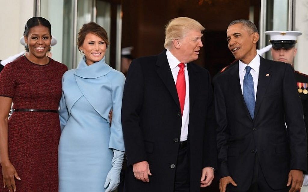 US President Barack Obama (R) and First Lady Michelle Obama (L) welcome Preisdent-elect Donald Trump (2nd-R) and his wife Melania to the White House in Washington, DC January 20, 2017.  (AFP PHOTO / JIM WATSON)
