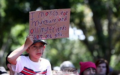Women protestors march in Sydney, Australia in a rally against US President Donald Trump on January 21, 2017. (AFP PHOTO/Andrew Murray) Women protestors march in Sydney, Australia in a rally against US President Donald Trump on January 21, 2017. (AFP PHOTO/Andrew Murray)