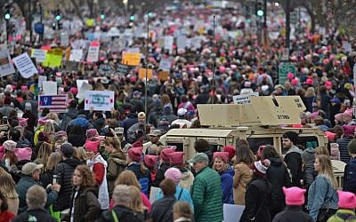 Demonstrators protest on the National Mall in Washington, DC, for the Women's March on January 21, 2017. (AFP PHOTO/Andrew CABALLERO-REYNOLDS)