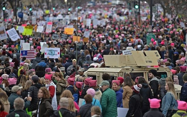 Demonstrators protest on the National Mall in Washington, DC, for the Women's March on January 21, 2017. (AFP PHOTO/Andrew CABALLERO-REYNOLDS) Demonstrators protest on the National Mall in Washington, DC, for the Women's March on January 21, 2017. (AFP PHOTO/Andrew CABALLERO-REYNOLDS)