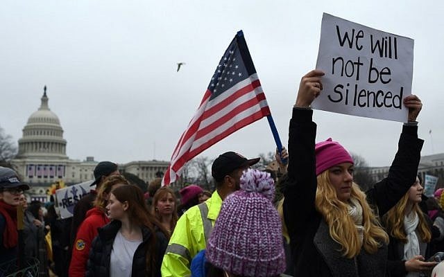Demonstrators protest on the National Mall in Washington, DC, for the Women's March on January 21, 2017. (AFP/ Andrew CABALLERO-REYNOLDS) Demonstrators protest on the National Mall in Washington, DC, for the Women's March on January 21, 2017. (AFP/ Andrew CABALLERO-REYNOLDS)