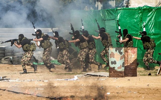 Members of the Palestinian Hamas armed forces take part in a graduation ceremony in Gaza City on January 22, 2017. (AFP PHOTO / MAHMUD HAMS) Members of the Palestinian Hamas armed forces take part in a graduation ceremony in Gaza City on January 22, 2017. (AFP PHOTO / MAHMUD HAMS)