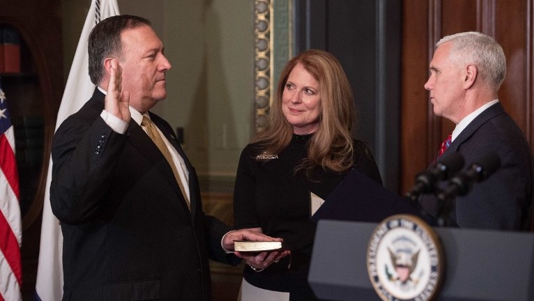 US Vice President Mike Pence, right, swears in Mike Pompeo as CIA director as his wife Susan looks on in the Vice President's Ceremonial Office at the Eisonhower Executive Office Building on January 23, 2017 in Washington, DC. (AFP/ NICHOLAS KAMM) US Vice President Mike Pence, right, swears in Mike Pompeo as CIA director as his wife Susan looks on in the Vice President's Ceremonial Office at the Eisonhower Executive Office Building on January 23, 2017 in Washington, DC. (AFP/ NICHOLAS KAMM)