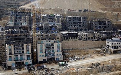 This file photo taken on December 28, 2016 shows a partial view of the West Bank settlement of Givat Zeev northwest of Jerusalem. (AFP Photo/Ahmad Gharabli)
