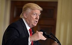 US President Donald Trump speaks during a joint press conference with Britain's Prime Minister Theresa May in the East Room of the White House on January 27, 2017 in Washington, DC. (AFP Photo/Mandel Ngan)