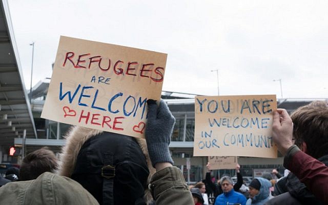 Protesters gather at JFK International Airport in New York on January 28, 2016, to demonstrate against US President Donald Trump's executive order suspending refugee arrivals and imposing tough controls on entry from 7 Muslim states. (AFP PHOTO/Bryan R. Smith)