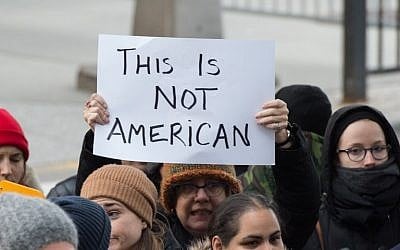 Protesters gather at JFK International Airport's Terminal 4 to demonstrate against US President Donald Trump's executive order on January 28, 2017, in New York.(AFP PHOTO / Bryan R. Smith)
