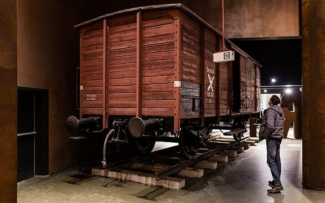 A man looks at a wagon on January 29, 2017 as part of the permanent exhibition of Museum of Second World War opened for two days ahead the official opening planned for the end of February in Gdansk, Poland. (AFP PHOTO / Wojtek RADWANSKI) A man looks at a wagon on January 29, 2017 as part of the permanent exhibition of Museum of Second World War opened for two days ahead the official opening planned for the end of February in Gdansk, Poland. (AFP PHOTO / Wojtek RADWANSKI)