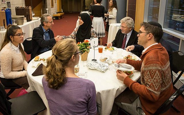 Lehigh University students, staff and faculty engage in dialogue with guest speaker Rabbi Yehuda Sarna (right) about his interfaith work, September 29, 2016. (John Kish)