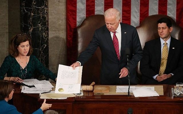 US Vice President Joseph Biden (C) presides over the counting of the electoral votes from the 2016 presidential election during a joint session of Congress, on January 6, 2017 in Washington, DC. (Mark Wilson/Getty Images/AFP) US Vice President Joseph Biden (C) presides over the counting of the electoral votes from the 2016 presidential election during a joint session of Congress, on January 6, 2017 in Washington, DC. (Mark Wilson/Getty Images/AFP)
