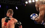 Yuri Foreman (left) fights against Erislandy Lara during the fourth round of their WBA World Super Welterweight Championship bout at Hialeah Park, in Miami, Florida, January 13, 2017 (Rob Foldy/Getty Images/AFP)
