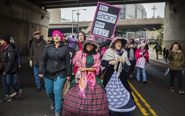 Protesters dressed in 19th century attire attend the Women's March in Washington DC on January 21, 2017 (Jessica Kourkounis/Getty Images/AFP) Protesters dressed in 19th century attire attend the Women's March in Washington DC on January 21, 2017 (Jessica Kourkounis/Getty Images/AFP)