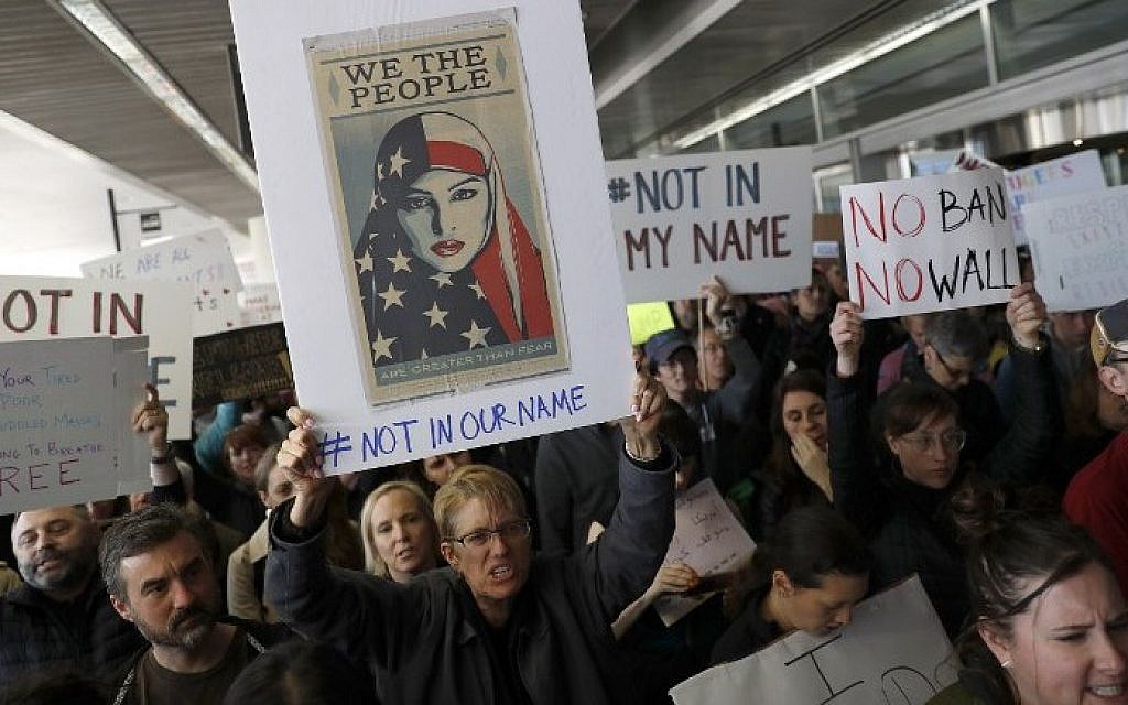 Demonstrators hold signs during a rally against a ban on Muslim immigration at San Francisco International Airport on January 28, 2017 in San Francisco, California. ( Stephen Lam/Getty Images/AFP) Demonstrators hold signs during a rally against a ban on Muslim immigration at San Francisco International Airport on January 28, 2017 in San Francisco, California. ( Stephen Lam/Getty Images/AFP)