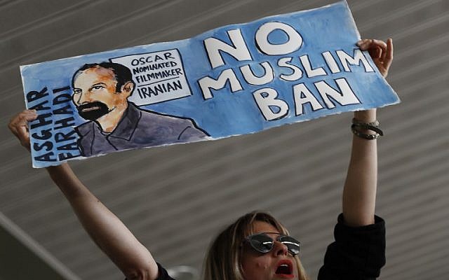 A woman holds a sign during a rally against a ban on Muslim immigration at San Francisco International Airport on January 28, 2017 in San Francisco, California. (Stephen Lam/Getty Images/AFP) A woman holds a sign during a rally against a ban on Muslim immigration at San Francisco International Airport on January 28, 2017 in San Francisco, California. (Stephen Lam/Getty Images/AFP)
