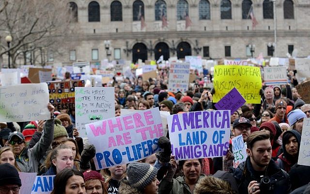 People gather in Copley Square to protest the Muslim immigration ban enacted by President Trump on January 29, 2017, in Boston, Massachusetts. (Darren McCollester/Getty Images/AFP)