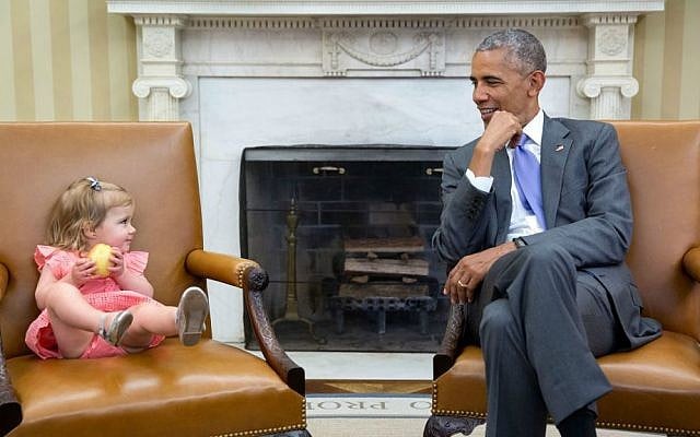 'The great thing about children is you just don’t know what they will do in the presence of the president. So when David Axelrod stopped by the Oval Office with his son's family, Axe’s granddaughter, Maelin, crawled onto the Vice President’s seat while the President continued his conversation with the adults. Then at one point, Maelin glanced over just as the president was looking back at her,' June 22, 2016. (Official White House photo/Pete Souza)