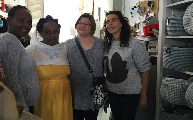 Julie Fisher (second from right) visits Kuchinate African Women's Collective in south Tel Aviv. It is a collective of women artists, many of whom are torture victims and have children with special needs. (Courtesy)