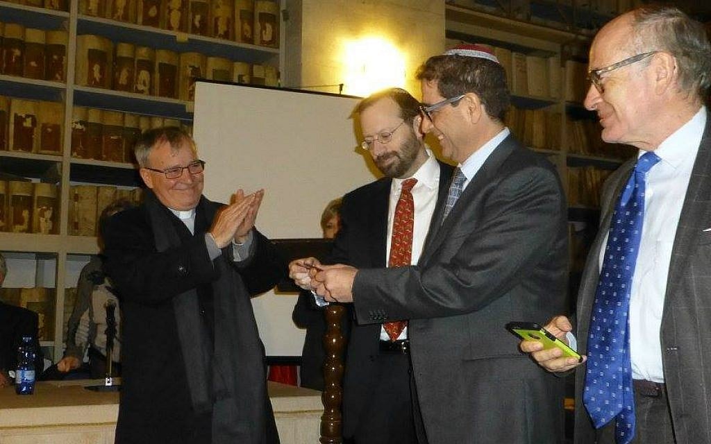 Rabbi Ariel Finzi, second from right, with Episcopal Vicar Raffaele Mangano (far left), Shavei Israel chairman Michael Freund (left of Finzi), and vice president of the Union of Italian Jewish Communities Giulio Disegni in an undated photo. (Courtesy) Rabbi Ariel Finzi, second from right, with Episcopal Vicar Raffaele Mangano (far left), Shavei Israel chairman Michael Freund (left of Finzi), and vice president of the Union of Italian Jewish Communities Giulio Disegni in an undated photo. (Courtesy)