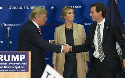 Donald Trump, left, shakes hands with Jared Kushner, husband of his daughter Ivanka, during a campaign stop at Concord High School, January 18, 2016, in Concord, NH (AP Photo/John Minchillo)