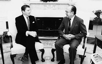 US President Ronald Reagan meets with Richard Schifter, US representative to the UN Human Rights Committee, in the Oval Office of the White House, February 2, 1984, in Washington. (AP Photo/White House Photo/Mary Anne Fackelman)