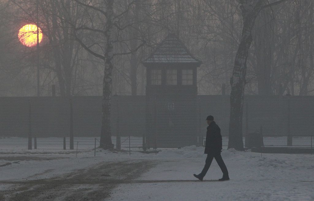 A man visits Auschwitz-Birkenau at sunrise on the 72nd anniversary of the liberation of the Nazi death camp, in Oswiecim, Poland, Friday, Jan. 27, 2017. (AP Photo/Czarek Sokolowski) A man visits Auschwitz-Birkenau at sunrise on the 72nd anniversary of the liberation of the Nazi death camp, in Oswiecim, Poland, Friday, Jan. 27, 2017. (AP Photo/Czarek Sokolowski)