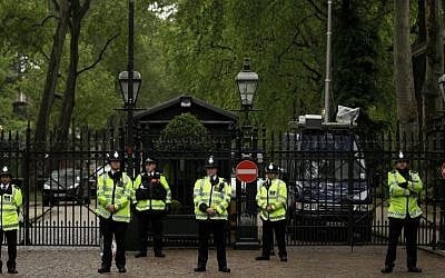 British police officers stand guard outside the Israeli Embassy in London during a protest against Israeli policy, on June 1, 2010. (AP/Matt Dunham)