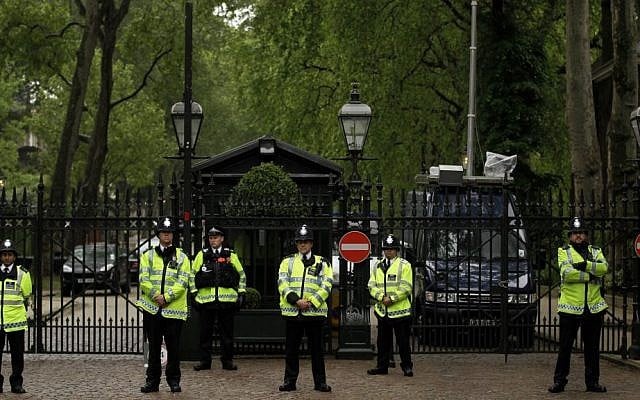 British police officers stand guard outside the Israeli embassy in London during a protest against Israeli policy, on Tuesday, June 1, 2010 (AP Photo/Matt Dunham)