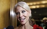 Trump adviser Kellyanne Conway winks as she speaks with reporters at the Indiana Inaugural Ball for Vice president-elect Mike Pence, Thursday, Jan. 19, 2017 in Washington. (AP Photo/Alex Brandon)