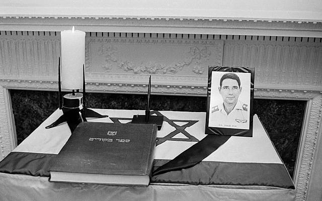 A photo of Israeli Col. Yosef Alon and a visitors book sit on a flag-draped memorial table at the Israeli embassy in Washington, July 1, 1973. (AP Photo/stf) A photo of Israeli Col. Yosef Alon and a visitors book sit on a flag-draped memorial table at the Israeli embassy in Washington, July 1, 1973. (AP Photo/stf)