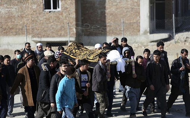 The day after two bombings, men carry the coffin of a relative who died in the attacks, in Kabul, Afghanistan, January 11, 2017. (AP/Rahmat Gul) The day after two bombings, men carry the coffin of a relative who died in the attacks, in Kabul, Afghanistan, January 11, 2017. (AP/Rahmat Gul)