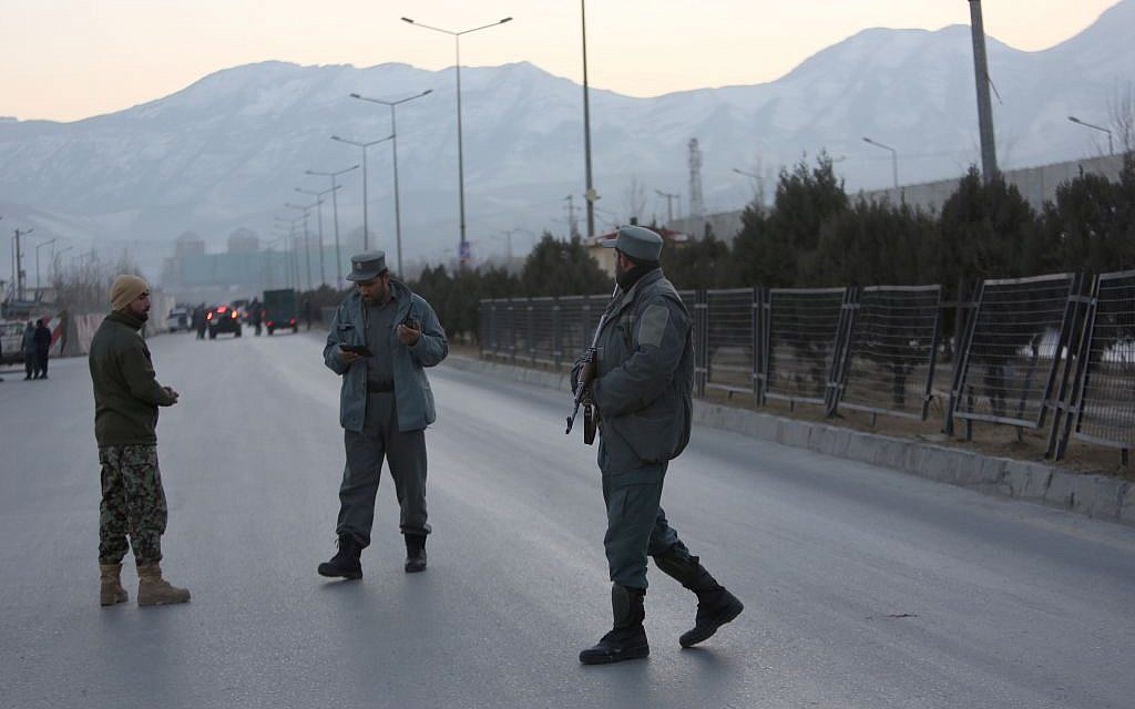 Afghan security forces stand guard near the site of two blasts in Kabul, Afghanistan, Tuesday, Jan. 10, 2017. Two loud explosions have rocked the Afghan capital of Kabul, causing casualties. The target of the blasts was probably an area that includes government and lawmakers' offices. Sediq Sediqqi, spokesman for the Interior Ministry, said that first, a suicide bomber carried out an attack, followed by a second explosion, caused by car bomb parked near the site. (AP Photo/Rahmat Gul) Afghan security forces stand guard near the site of two blasts in Kabul, Afghanistan, Tuesday, Jan. 10, 2017. Two loud explosions have rocked the Afghan capital of Kabul, causing casualties. The target of the blasts was probably an area that includes government and lawmakers' offices. Sediq Sediqqi, spokesman for the Interior Ministry, said that first, a suicide bomber carried out an attack, followed by a second explosion, caused by car bomb parked near the site. (AP Photo/Rahmat Gul)