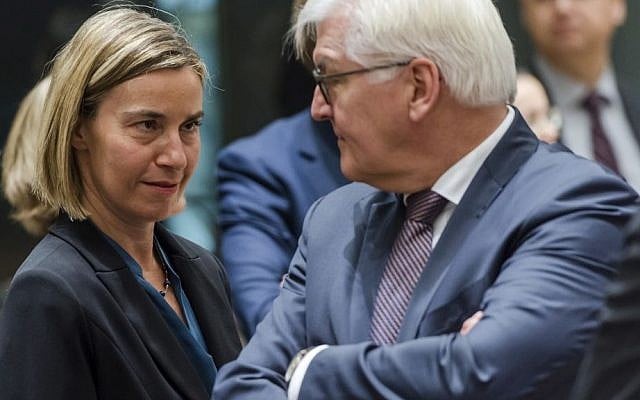 EU foreign policy chief Federica Mogherini, left, talks with German Foreign Minister Frank-Walter Steinmeier during an EU foreign ministers meeting at the EU Council in Brussels on January 16, 2017. (AP/Geert Vanden Wijngaert)