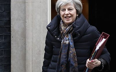 British Prime Minister Theresa May leaves 10 Downing Street in London, Jan. 25, 2017. (AP Photo/Kirsty Wigglesworth)