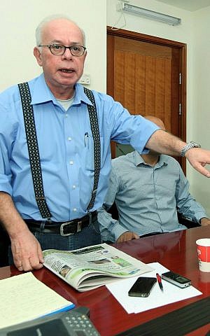Editor of the free Hebrew daily Israel Hayom Amos Regev. April 9, 2012. (Moshe Shai/Flash90)