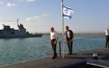 Then-Defense Moshe Ya'alon aboard the INS Tanin submarine as it docks for the first time at the Haifa Port, September 23, 2014. (Ariel Hermoni/Ministry of Defense/ FLASH90)