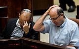 Then defense minister Moshe Ya'alon (R) seen with Education Minister Naftali Bennett during a plenum session at the plenary in the Knesset on May 25, 2015. (Yonatan Sindel/Flash90)