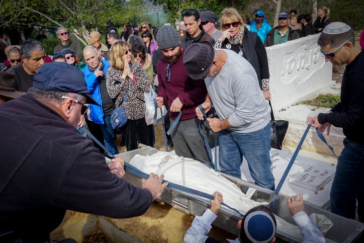 Family and friends attend the funeral of Guy Kafri, who was killed in a Haifa shooting, at a cemetery in the community of Ofer, south of Haifa, on January 5, 2017. (Basel Awidat/FLASH90) Family and friends attend the funeral of Guy Kafri, who was killed in a Haifa shooting, at a cemetery in the community of Ofer, south of Haifa, on January 5, 2017. (Basel Awidat/FLASH90)