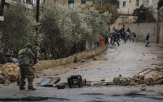 Illustrative. Palestinians clash with Israeli security forces in Jenin on February 6, 2016. (Haytham Shtayeh/FLASH90) Illustrative. Palestinians clash with Israeli security forces in Jenin on February 6, 2016. (Haytham Shtayeh/FLASH90)