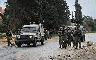 Illustrative: Security forces during clashes with protesters at the entrance to the village of Qabatiya in Jenin, February 6, 2016. (Haytham Shtayeh/FLASH90)