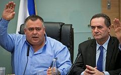 Coalition Chairman David Bitan seen with Transportation Minister Yisrael Katz (R) during a Knesset committee meeting in the Knesset, on March 23, 2016 (Yonatan Sindel/Flash90)