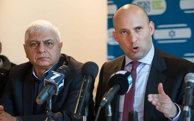 Jewish Home party leader and Education Minister Naftali Bennett, right, leads a special party faction meeting in the West Bank settlement city of Maale Adumin, January 2, 2017. (Yonatan Sindel/Flash90 