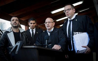 The legal team of IDF Sgt. Elor Azaria speaks to press at the Kirya military base in Tel Aviv following a verdict on January 4, 2017. (Miriam Alster/FLASH90)