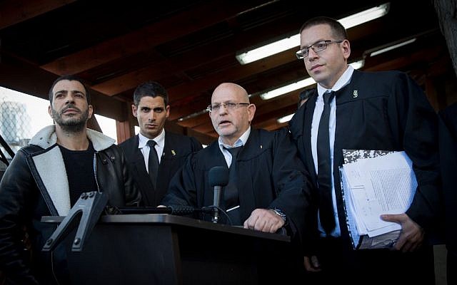 Attorneys Ilan Katz, center, and Eyal Besserglick, right, the legal team of IDF Sgt. Elor Azaria speak to press at the Kirya military base in Tel Aviv following a verdict on January 4, 2017. (Miriam Alster/FLASH90) Attorneys Ilan Katz, center, and Eyal Besserglick, right, the legal team of IDF Sgt. Elor Azaria speak to press at the Kirya military base in Tel Aviv following a verdict on January 4, 2017. (Miriam Alster/FLASH90)