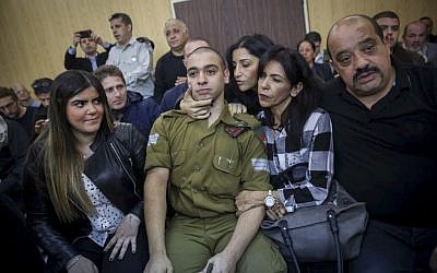 Elor Azaria, an Israeli soldier who shot a Palestinian terrorist in Hebron, sits in the courtroom before the announcement of his verdict at the Kirya military base in Tel Aviv on Wednesday, January 4, 2017 (Miriam Alster/Flash90) Elor Azaria, an Israeli soldier who shot a Palestinian terrorist in Hebron, sits in the courtroom before the announcement of his verdict at the Kirya military base in Tel Aviv on Wednesday, January 4, 2017 (Miriam Alster/Flash90)