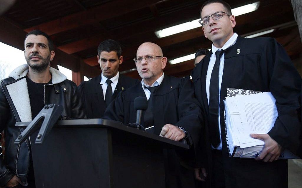 Following his manslaughter conviction for shooting a mortally wounded Palestinian attacker in Hebron, the legal team for IDF Sgt. Elior Azaria, speak to the press outside the courtroom at the Kirya military base Tel Aviv,  January 4, 2017. (Miriam Alster/Flash90)