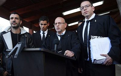Following his manslaughter conviction for shooting a mortally wounded Palestinian attacker in Hebron, the legal team for IDF Sgt. Elior Azaria, speak to the press outside the courtroom at the Kirya military base Tel Aviv, January 4, 2017. (Miriam Alster/Flash90) 
