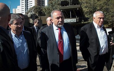 Defense Minister Avigdor Liberman, center, tours the Israel Military Industries factory, January 4, 2017. (Roy Alima/Flash90)